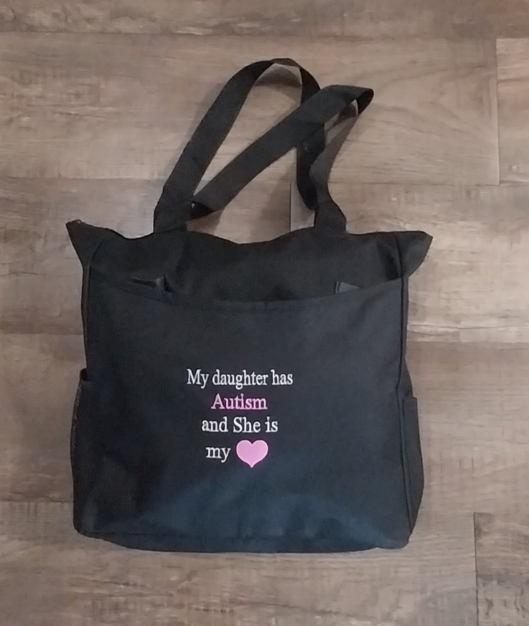 My daughter has Autism and She is my heart Tote Bag