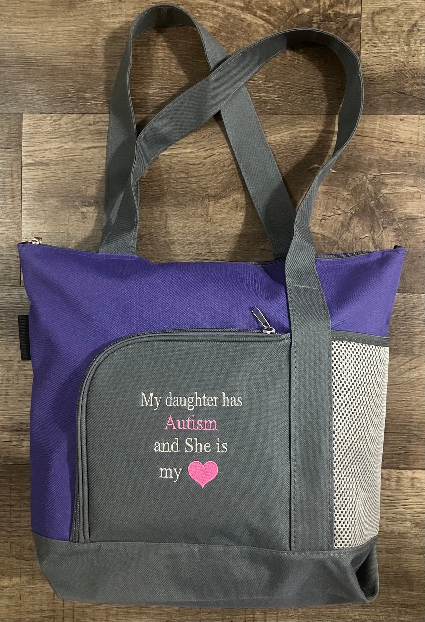 My daughter has Autism and She is my heart Tote Bag